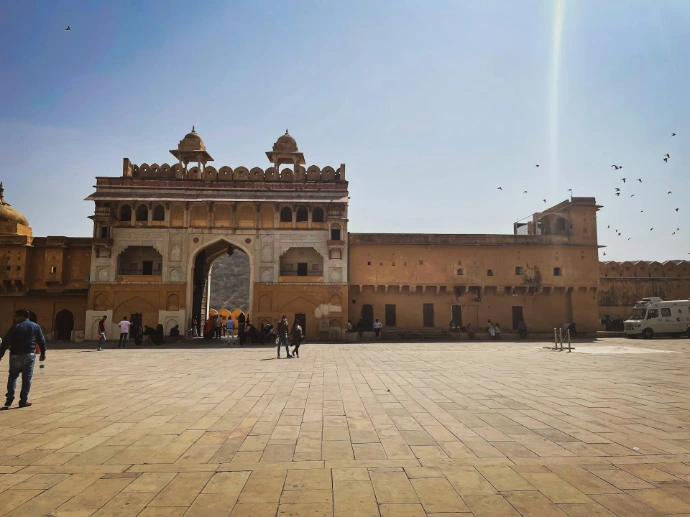 a group of people standing in front of a building